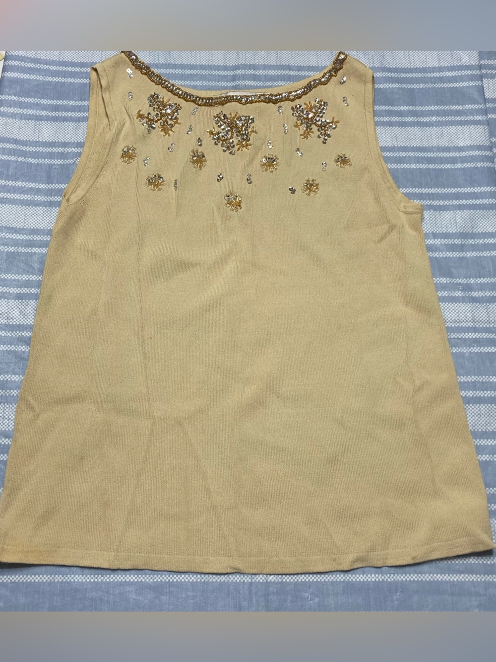 Joseph A beige top with rhinestone embellishments.